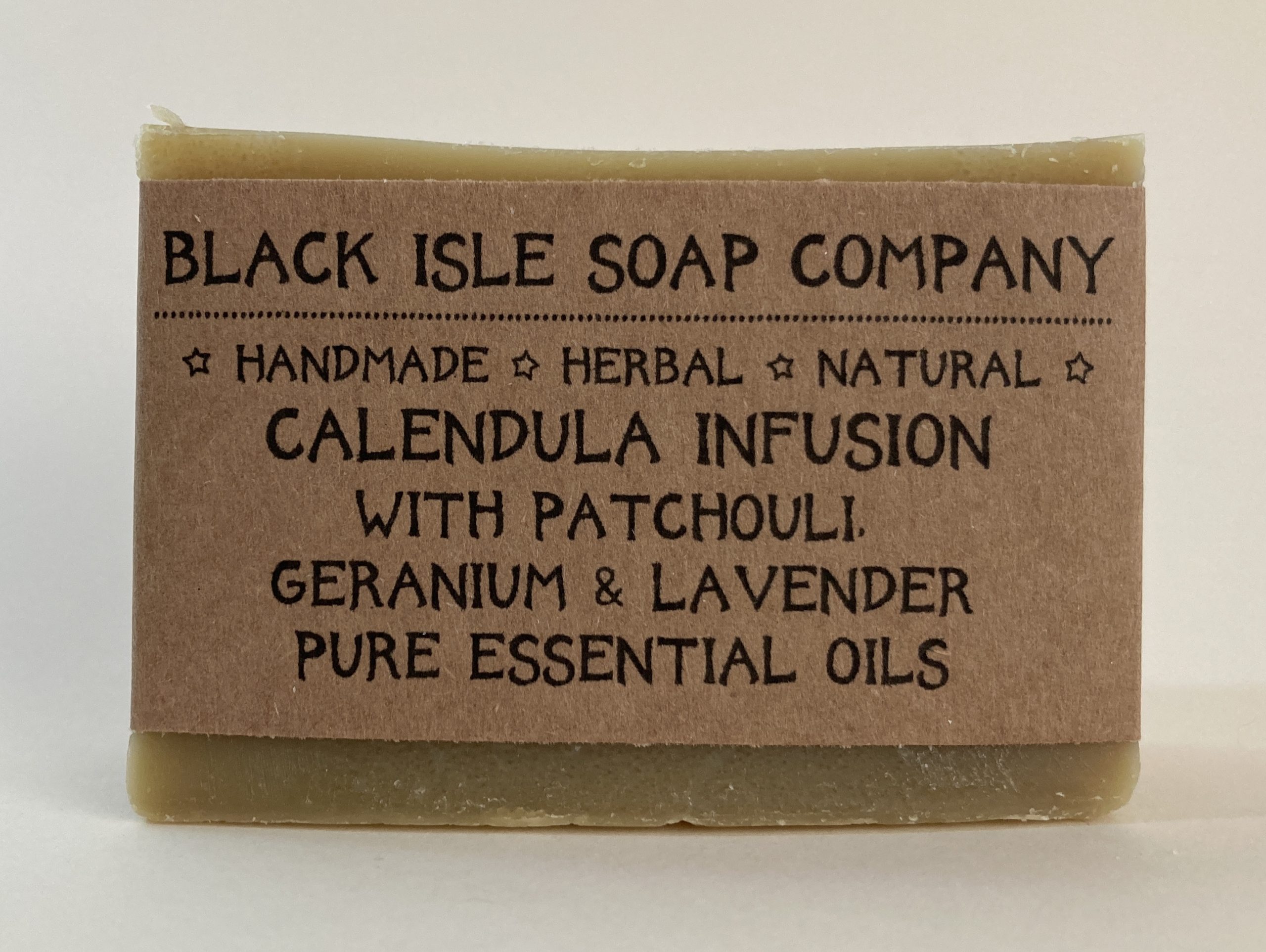 a light natural yellow coloured soap bar wrapped in brown paper scented with patchouli, geranium and lavender. This smells so good, with the sensual musky tones of the patchouli lifted with the fresh sweet lavender.